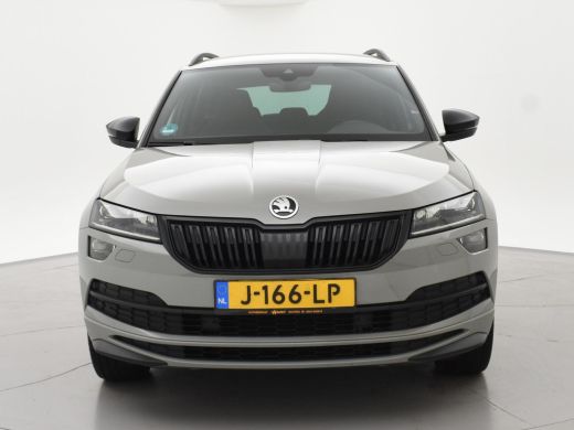 Skoda Karoq 1.5 TSI ACT 150 PK DSG AUT. SPORTLINE STEEL GREY + VIRTUAL COCKPIT | TREKHAAK | CAMERA | ADAPTIVE... ActivLease financial lease