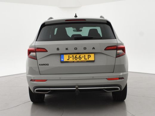 Skoda Karoq 1.5 TSI ACT 150 PK DSG AUT. SPORTLINE STEEL GREY + VIRTUAL COCKPIT | TREKHAAK | CAMERA | ADAPTIVE... ActivLease financial lease