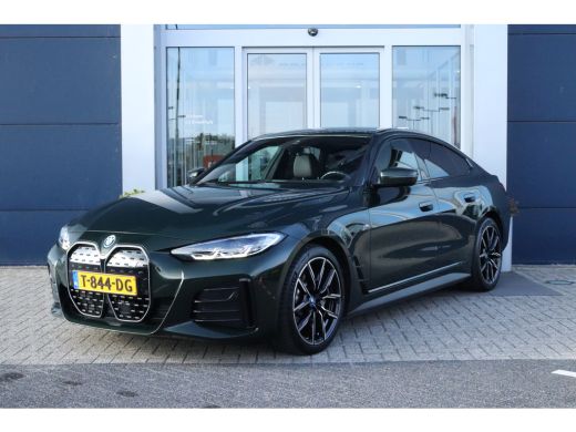 BMW i4 eDrive40 High Executive 84 kWh M-Sport Sanremo Grün | HUD | Camera | Carplay | Trekhaak | Elektri... BMW i4 eDrive40 High Executive 84 kWh M-Sport Sanremo Grün | HUD | Camera | Carplay | Trekhaak | Elektri...