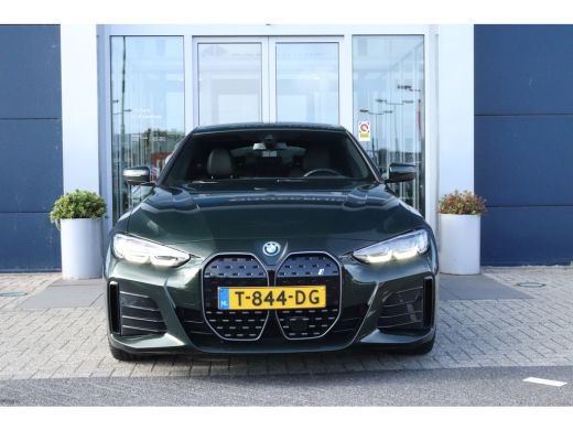 BMW i4 eDrive40 High Executive 84 kWh M-Sport Sanremo Grün | HUD | Camera | Carplay | Trekhaak | Elektri... ActivLease financial lease