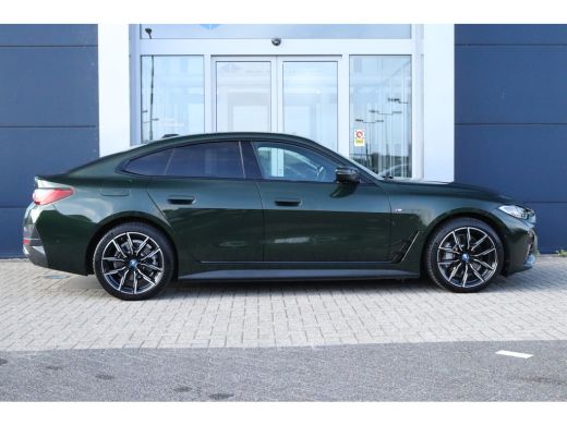 BMW i4 eDrive40 High Executive 84 kWh M-Sport Sanremo Grün | HUD | Camera | Carplay | Trekhaak | Elektri... ActivLease financial lease