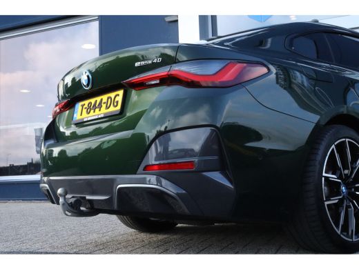 BMW i4 eDrive40 High Executive 84 kWh M-Sport Sanremo Grün | HUD | Camera | Carplay | Trekhaak | Elektri... ActivLease financial lease