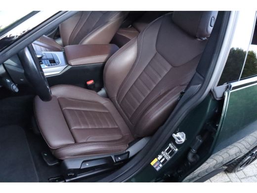 BMW i4 eDrive40 High Executive 84 kWh M-Sport Sanremo Grün | HUD | Camera | Carplay | Trekhaak | Elektri... ActivLease financial lease