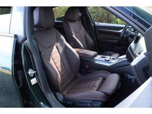 BMW i4 eDrive40 High Executive 84 kWh M-Sport Sanremo Grün | HUD | Camera | Carplay | Trekhaak | Elektri... ActivLease financial lease