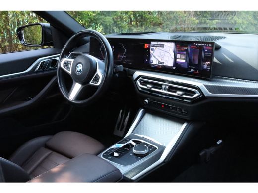 BMW i4 eDrive40 High Executive 84 kWh M-Sport Sanremo Grün | HUD | Camera | Carplay | Trekhaak | Elektri... ActivLease financial lease