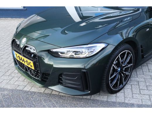 BMW i4 eDrive40 High Executive 84 kWh M-Sport Sanremo Grün | HUD | Camera | Carplay | Trekhaak | Elektri... ActivLease financial lease