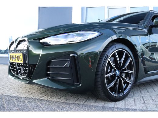 BMW i4 eDrive40 High Executive 84 kWh M-Sport Sanremo Grün | HUD | Camera | Carplay | Trekhaak | Elektri... ActivLease financial lease