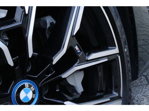 BMW i4 eDrive40 High Executive 84 kWh M-Sport Sanremo Grün | HUD | Camera | Carplay | Trekhaak | Elektri... ActivLease financial lease
