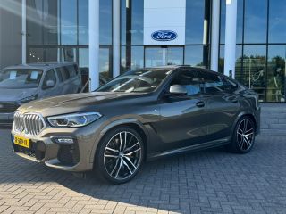 BMW X6 xDrive40i High Executive | HUD | H&K | Pano | Luchtvering | 360 Camera | Stuurverwarming | Memory...