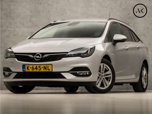 Opel Astra Sports Tourer 1.4 Sport 146Pk Automaat (APPLE CARPLAY, NAVIGATIE, CLIMATE, CAMERA, GETINT GLAS, S... Opel Astra Sports Tourer 1.4 Sport 146Pk Automaat (APPLE CARPLAY, NAVIGATIE, CLIMATE, CAMERA, GETINT GLAS, S...