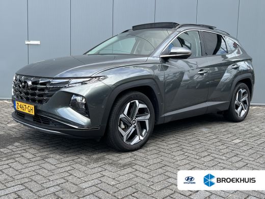 Hyundai Tucson 1.6 T-GDI 265pk PHEV Premium Sky 4WD | Leder | Schuif kanteldak | Keyless | Navigatie | Elektrisc... Hyundai Tucson 1.6 T-GDI 265pk PHEV Premium Sky 4WD | Leder | Schuif kanteldak | Keyless | Navigatie | Elektrisc...