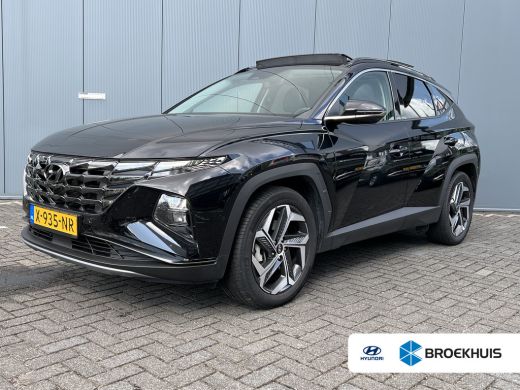 Hyundai Tucson 1.6 T-GDI 265pk PHEV Premium Sky 4WD | Leder | Schuif kanteldak | Keyless | Navigatie | Elektrisc... Hyundai Tucson 1.6 T-GDI 265pk PHEV Premium Sky 4WD | Leder | Schuif kanteldak | Keyless | Navigatie | Elektrisc...