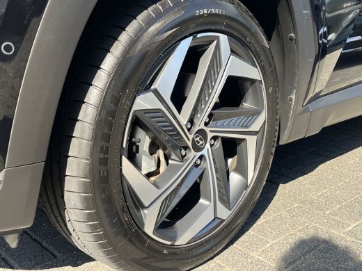 Hyundai Tucson 1.6 T-GDI 265pk PHEV Premium Sky 4WD | Leder | Schuif kanteldak | Keyless | Navigatie | Elektrisc... ActivLease financial lease
