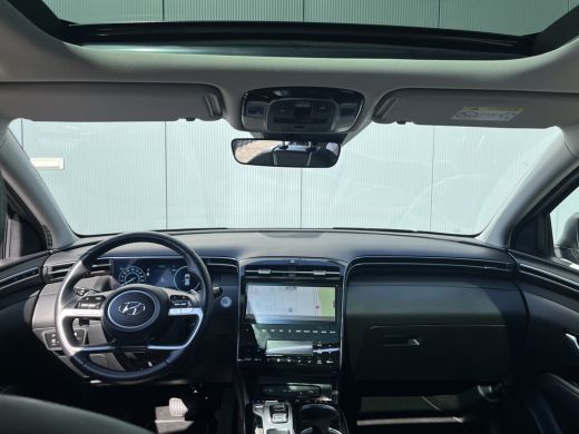 Hyundai Tucson 1.6 T-GDI 265pk PHEV Premium Sky 4WD | Leder | Schuif kanteldak | Keyless | Navigatie | Elektrisc... ActivLease financial lease