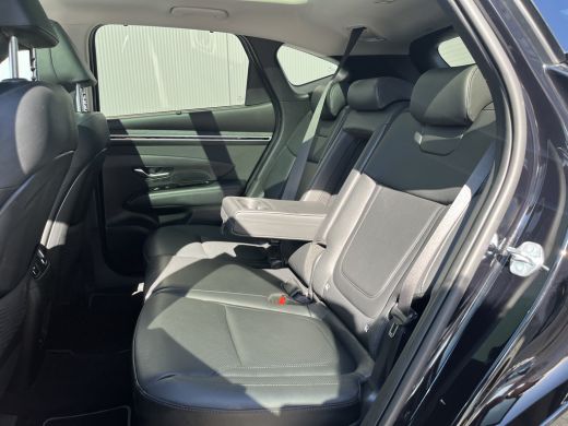 Hyundai Tucson 1.6 T-GDI 265pk PHEV Premium Sky 4WD | Leder | Schuif kanteldak | Keyless | Navigatie | Elektrisc... ActivLease financial lease