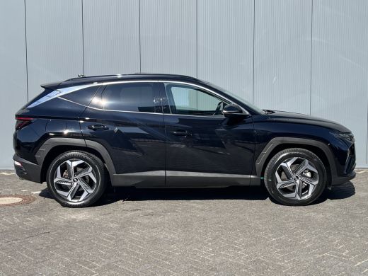 Hyundai Tucson 1.6 T-GDI 265pk PHEV Premium Sky 4WD | Leder | Schuif kanteldak | Keyless | Navigatie | Elektrisc... ActivLease financial lease