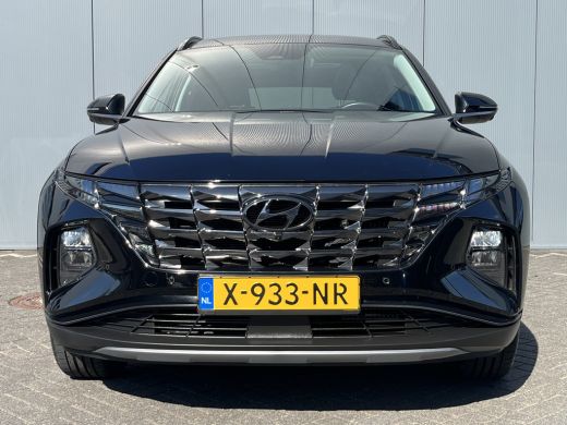 Hyundai Tucson 1.6 T-GDI 265pk PHEV Premium Sky 4WD | Leder | Schuif kanteldak | Keyless | Navigatie | Elektrisc... ActivLease financial lease