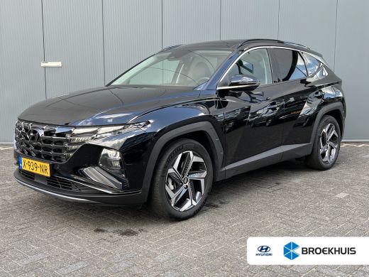 Hyundai Tucson 1.6 T-GDI PHEV 265pk Premium Sky 4WD | Leder | Schuif kanteldak | Climate | Keyless | Navigatie |... Hyundai Tucson 1.6 T-GDI PHEV 265pk Premium Sky 4WD | Leder | Schuif kanteldak | Climate | Keyless | Navigatie |...