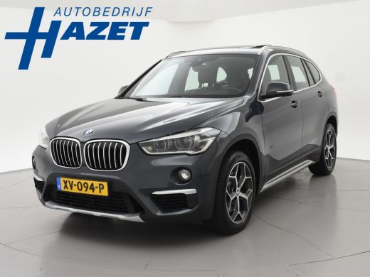 BMW X1 sDrive20i 192 PK AUT. + TREKHAAK | PANORAMA | SPORTSTOELEN LEDER | HEAD-UP | CAMERA | STOELVERWAR...