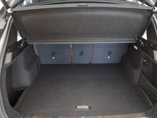 BMW X1 sDrive20i 192 PK AUT. + TREKHAAK | PANORAMA | SPORTSTOELEN LEDER | HEAD-UP | CAMERA | STOELVERWAR... ActivLease financial lease