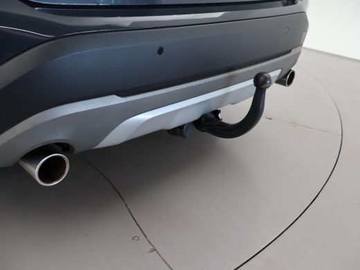 BMW X1 sDrive20i 192 PK AUT. + TREKHAAK | PANORAMA | SPORTSTOELEN LEDER | HEAD-UP | CAMERA | STOELVERWAR... ActivLease financial lease