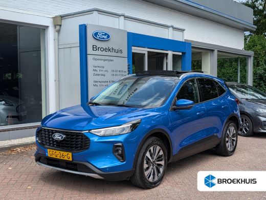 Ford Kuga 2.5 PHEV Titanium 242pk | Carplay | Navi | Adap. Cruise | Keyless | Panoramadak | Voorruitverwarming Ford Kuga 2.5 PHEV Titanium 242pk | Carplay | Navi | Adap. Cruise | Keyless | Panoramadak | Voorruitverwarming