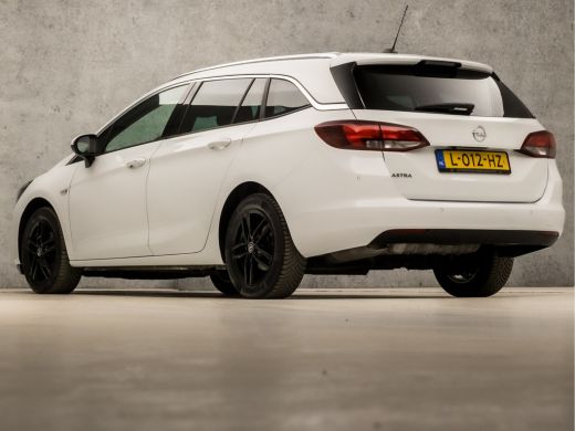 Opel Astra Sports Tourer 1.2 Elegance (APPLE CARPLAY, NAVIGATIE, CLIMATE, CAMERA, ADAPTIVE CRUISE, LEDER, SP... ActivLease financial lease