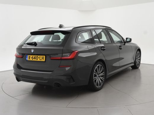 BMW 3 Serie Touring 318i AUT. M-SPORT DRAVITGRAU + SPORTSTOELEN | CAMERA | MEMORY | HIFI | SFEERVERLICHTING |... ActivLease financial lease
