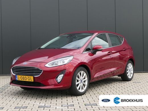 Ford Fiesta 1.0 EcoBoost Titanium | Winterpack | Navigatie | 16 Inch Lichtmetalen Velgen | Parkeersensoren | ... Ford Fiesta 1.0 EcoBoost Titanium | Winterpack | Navigatie | 16 Inch Lichtmetalen Velgen | Parkeersensoren | ...