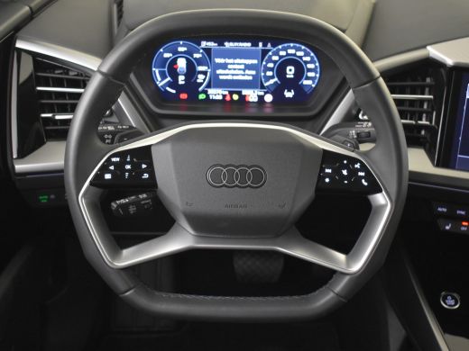 Audi Q4 e-tron 45 quattro Advanced edition 82 kWh 286pk | Dodehoek detectie l Elektr. Verst. Stoel l Elektr. Ach... ActivLease financial lease