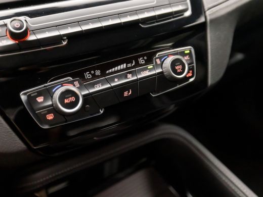 BMW X1 sDrive18i High Executive Automaat (GROOT NAVI, DEALER ONDERHOUDEN, CLIMATE, LEDER, GETINT GLAS, S... ActivLease financial lease