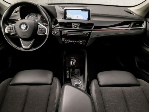 BMW X1 sDrive18i High Executive Automaat (GROOT NAVI, DEALER ONDERHOUDEN, CLIMATE, LEDER, GETINT GLAS, S... ActivLease financial lease