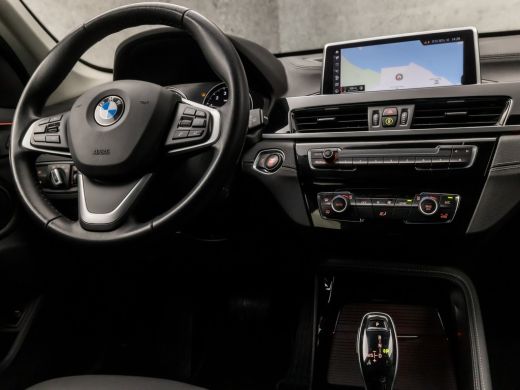 BMW X1 sDrive18i High Executive Automaat (GROOT NAVI, DEALER ONDERHOUDEN, CLIMATE, LEDER, GETINT GLAS, S... ActivLease financial lease