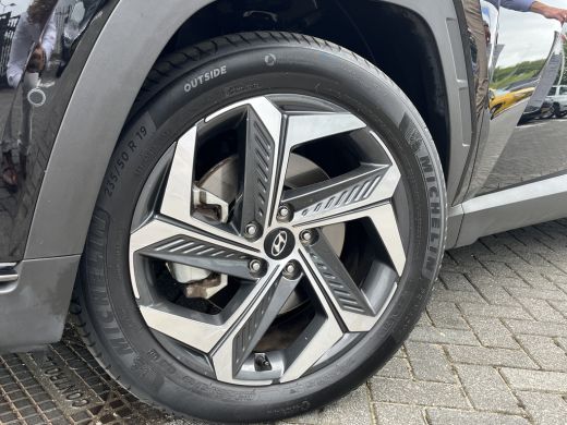 Hyundai Tucson 1.6 T-GDI 265pk PHEV Premium Sky 4WD | Leder | Carplay | Climate | Keyless | Navigatie | Elek. Kl... ActivLease financial lease