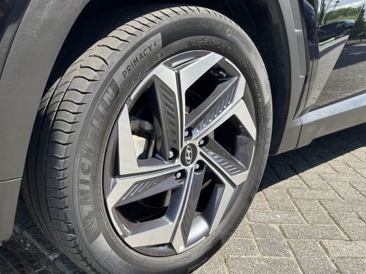 Hyundai Tucson 1.6 T-GDI 265pk PHEV Premium Sky 4WD | Leder | Carplay | Climate | Keyless | Navigatie | Elek. Kl... ActivLease financial lease