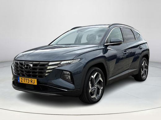 Hyundai Tucson 1.6 T-GDI PHEV Comfort Smart 4WD | Rijklaarprijs! | Adaptive Cruise Control | 19"Lm velgen | Nav... Hyundai Tucson 1.6 T-GDI PHEV Comfort Smart 4WD | Rijklaarprijs! | Adaptive Cruise Control | 19"Lm velgen | Nav...