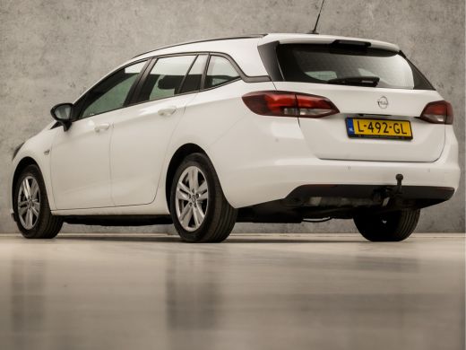 Opel Astra Sports Tourer 1.4 Turbo Sport 146Pk Automaat (APPLE CARPLAY, NAVIGATIE, CAMERA, CRUISE, PARKEERSE... ActivLease financial lease