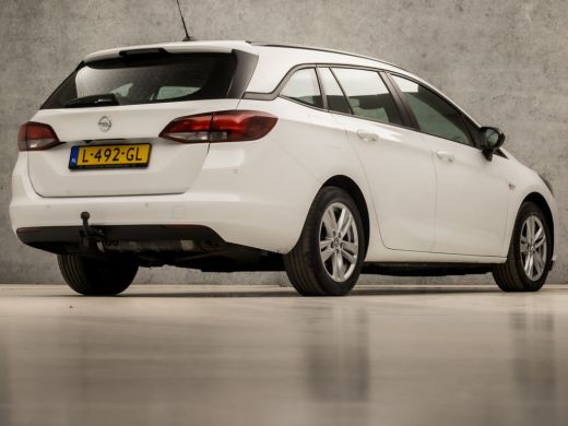 Opel Astra Sports Tourer 1.4 Turbo Sport 146Pk Automaat (APPLE CARPLAY, NAVIGATIE, CAMERA, CRUISE, PARKEERSE... ActivLease financial lease