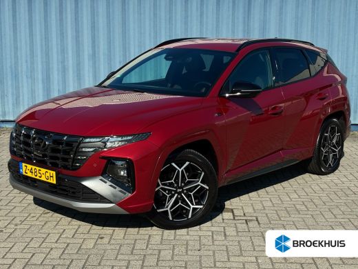 Hyundai Tucson 1.6 T-GDI PHEV N Line 4WD Sunset Red | 4 x 4 | Airco AUTO | Cruise Control Adaptive | Stoelverwar... Hyundai Tucson 1.6 T-GDI PHEV N Line 4WD Sunset Red | 4 x 4 | Airco AUTO | Cruise Control Adaptive | Stoelverwar...