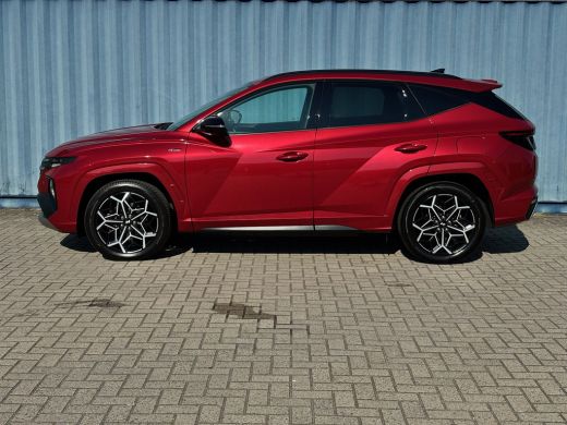 Hyundai Tucson 1.6 T-GDI PHEV N Line 4WD Sunset Red | 4 x 4 | Airco AUTO | Cruise Control Adaptive | Stoelverwar... ActivLease financial lease