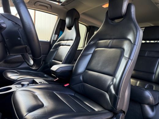 BMW i3 120Ah 42 kWh For The Oceans/S-dak/Adaptive/1e Eig./leder/H-Kardon/W-pomp/3-fase ActivLease financial lease