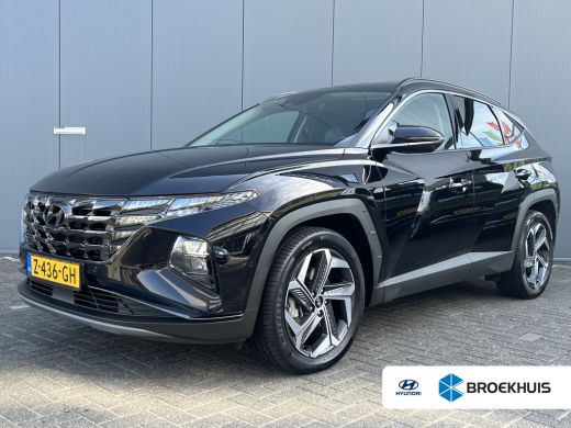 Hyundai Tucson 1.6 T-GDI 265pk PHEV Premium 4WD | Leder | Carplay | Climate | Keyless | Navigatie | Elek. Klep |... Hyundai Tucson 1.6 T-GDI 265pk PHEV Premium 4WD | Leder | Carplay | Climate | Keyless | Navigatie | Elek. Klep |...