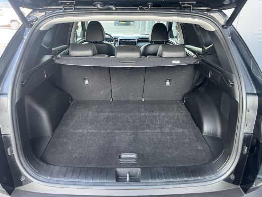 Hyundai Tucson 1.6 T-GDI 265pk PHEV Premium 4WD | Leder | Carplay | Climate | Keyless | Navigatie | Elek. Klep |... ActivLease financial lease