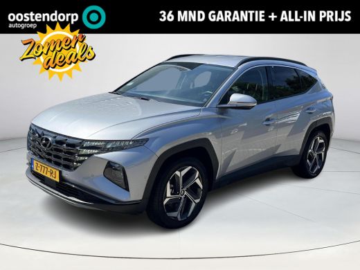 Hyundai Tucson 1.6 T-GDI PHEV Premium 4WD Rijklaarprijs! Dus geen extra afleverkosten! | 360 graden camera| Lede... Hyundai Tucson 1.6 T-GDI PHEV Premium 4WD Rijklaarprijs! Dus geen extra afleverkosten! | 360 graden camera| Lede...
