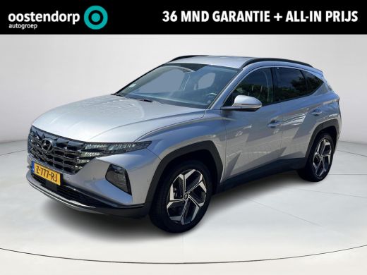 Hyundai Tucson 1.6 T-GDI PHEV Premium 4WD | Rijklaarprijs dus GEEN afleverkosten! | 360 graden camera| Leder | V... Hyundai Tucson 1.6 T-GDI PHEV Premium 4WD | Rijklaarprijs dus GEEN afleverkosten! | 360 graden camera| Leder | V...