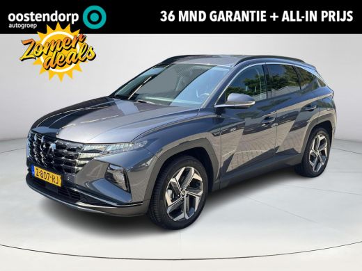 Hyundai Tucson 1.6 T-GDI PHEV Premium 4WD Rijklaarprijs! Dus geen extra afleverkosten! | 360 graden camera| Lede... Hyundai Tucson 1.6 T-GDI PHEV Premium 4WD Rijklaarprijs! Dus geen extra afleverkosten! | 360 graden camera| Lede...