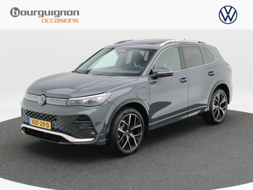Volkswagen Tiguan 1.5 eHybrid 272 Pk Automaat R-Line Edition | Panorama Dak | Trekhaak | Massage Stoelen | Camera |... Volkswagen Tiguan 1.5 eHybrid 272 Pk Automaat R-Line Edition | Panorama Dak | Trekhaak | Massage Stoelen | Camera |...