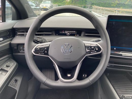 Volkswagen ID.7 Pro Business | Achterbank in ongelijke delen neerklapbaar incl. middenarmsteun en doorlaadmogelij... ActivLease financial lease