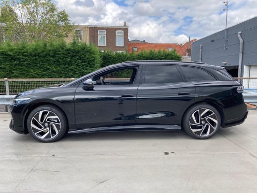 Volkswagen ID.7 Pro Business | Achterbank in ongelijke delen neerklapbaar incl. middenarmsteun en doorlaadmogelij... ActivLease financial lease