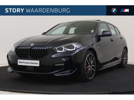 BMW 1 Serie 118i High Executive M Sport Automaat / Panoramadak / Sportstoelen / Achteruitrijcamera / Adaptiev... BMW 1 Serie 118i High Executive M Sport Automaat / Panoramadak / Sportstoelen / Achteruitrijcamera / Adaptiev...